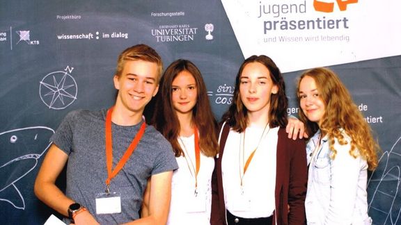 Gruppenfoto mit vier Teilnehmern